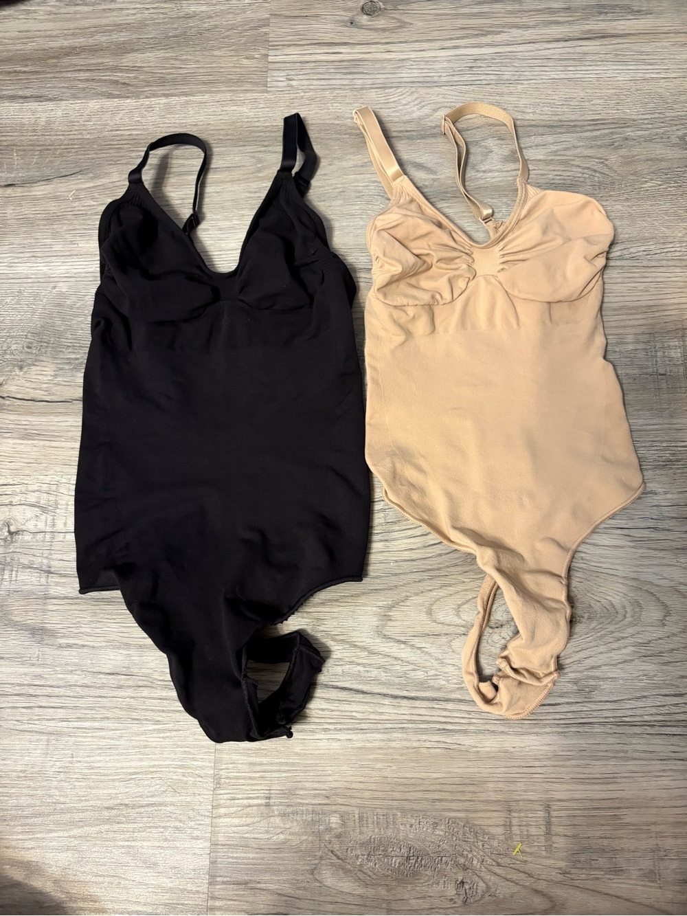 SKIMS Sculpting Bodysuits in Black & Nude